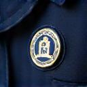 Badge de certification sur un uniforme propreté